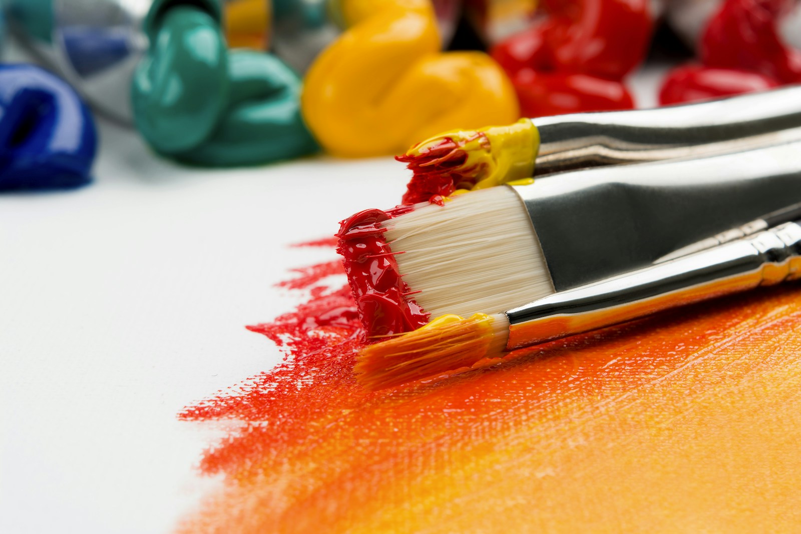 Colorful paintbrushes and paint